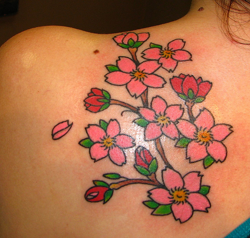 Flower foot tattoos can either be a cherry blossom, a rose, hibiscus,
