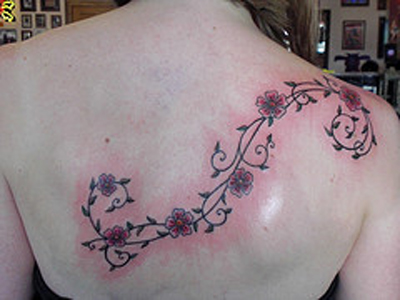 cherry blossom vine tattoo