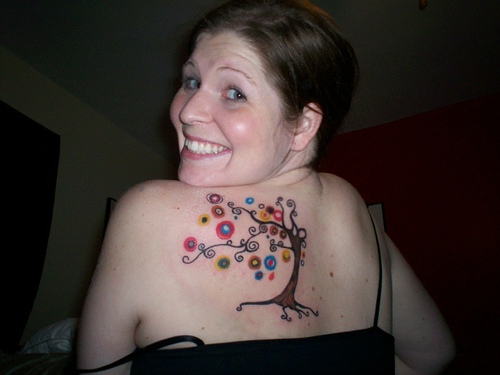 Bird in a tree tattoo