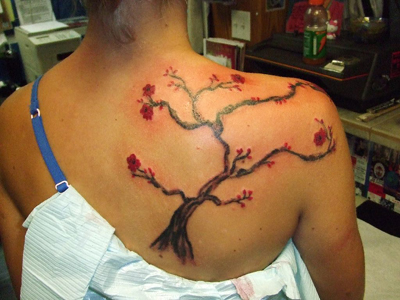 tree tattoos. small cherry tree tattoos.