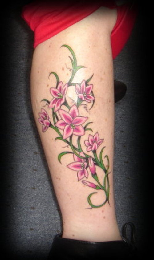 tattoo of flowers. black and grey flower tattoo