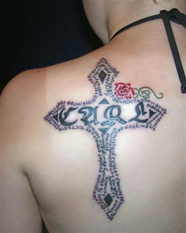 girl cross tattoos