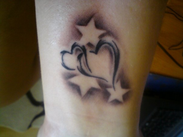 matching star tattoos for best friends. heart and stars tattoos